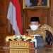 Gubernur Al Haris Ikuti Vidcom Mendegar Arahan Presiden Dalam Penaganan Covid-19