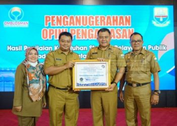 Muaro Jambi Menerima Penghargaan Predikat Kepatuhan Standar Pelayanan Publik Tahun 2022