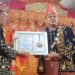Yuli Setia Bakti Dianugerahi Gelar Adat Melayu Jambi Adipati Agung Setyo Negeri