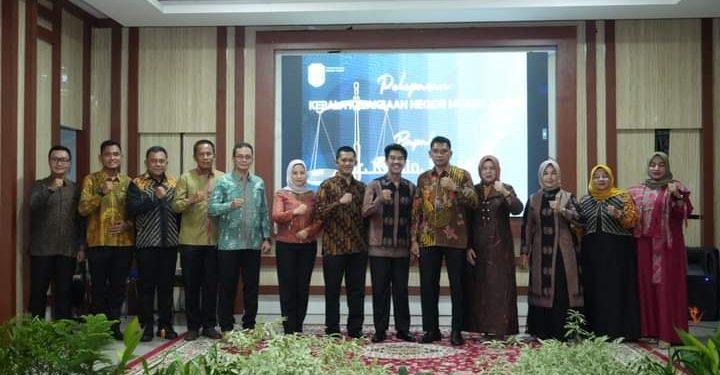 Pj Bupati Raden Najmi Hadiri Acara Pelepasan Kajari Muaro Jambi