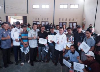 Pj Bupati Najmi Dampingi Gubernur Jambi di Acara Gerakan Pangan Murah 