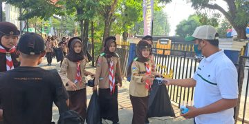 Cegah Dampak Kabut Asap, ADYA Group dan IJTI Jambi Turun ke Jalan Bagikan Masker Gratis