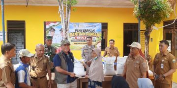 Penyerahan Bantuan Pangan di Desa Kasang Pudak, Dihadiri Kepala Bulog Jambi dan Kadis Ketahanan Pangan Muaro Jambi